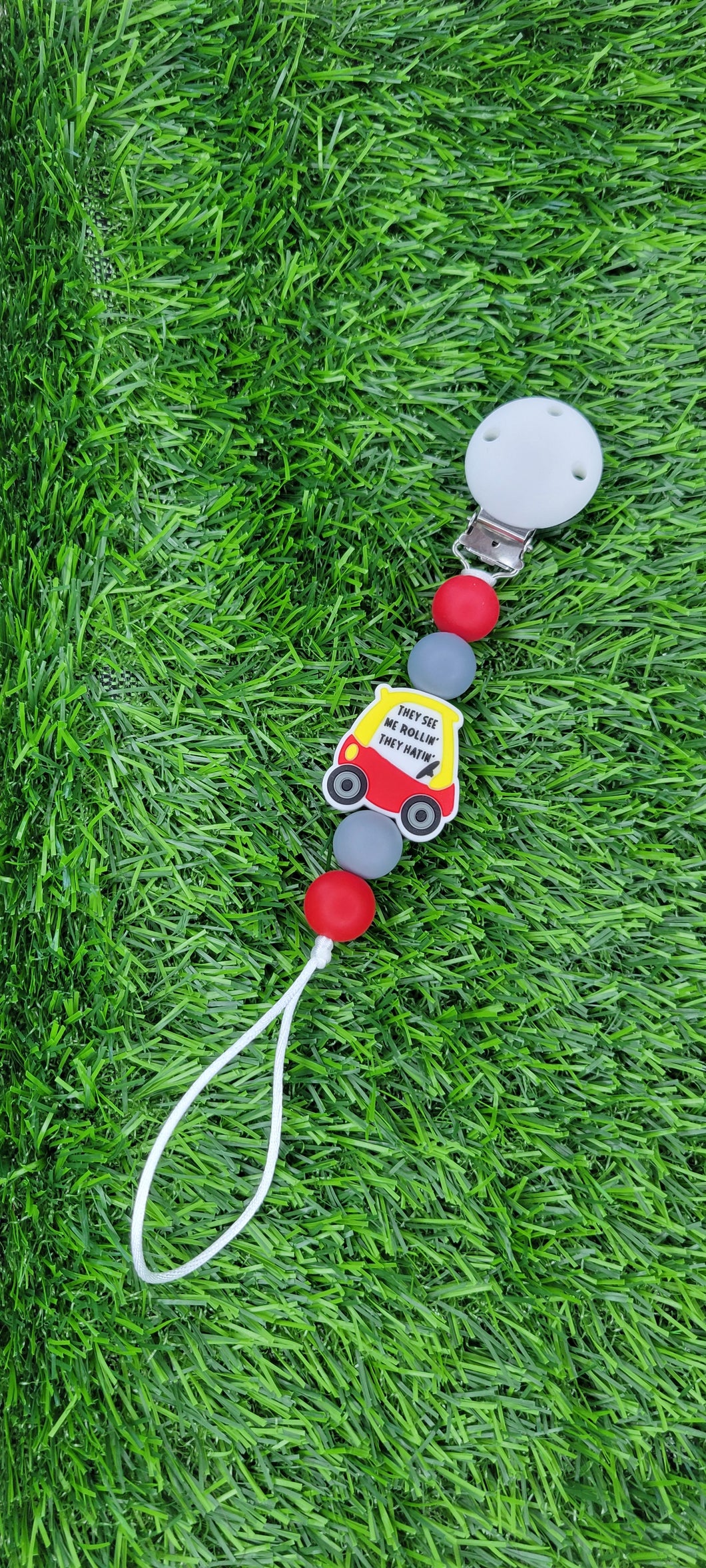 They See Me Rollin' Pacifier Clip