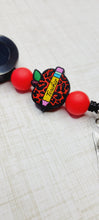 Load image into Gallery viewer, Teacher Cheetah Apple Badge Reel
