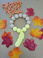 Load image into Gallery viewer, Yellow Feather Teething Ring, Silicone and Beechwood
